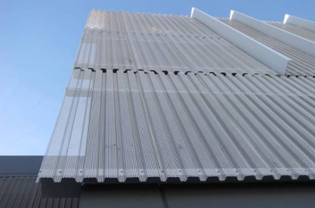 Фасад с перфорированным профлистом Т150